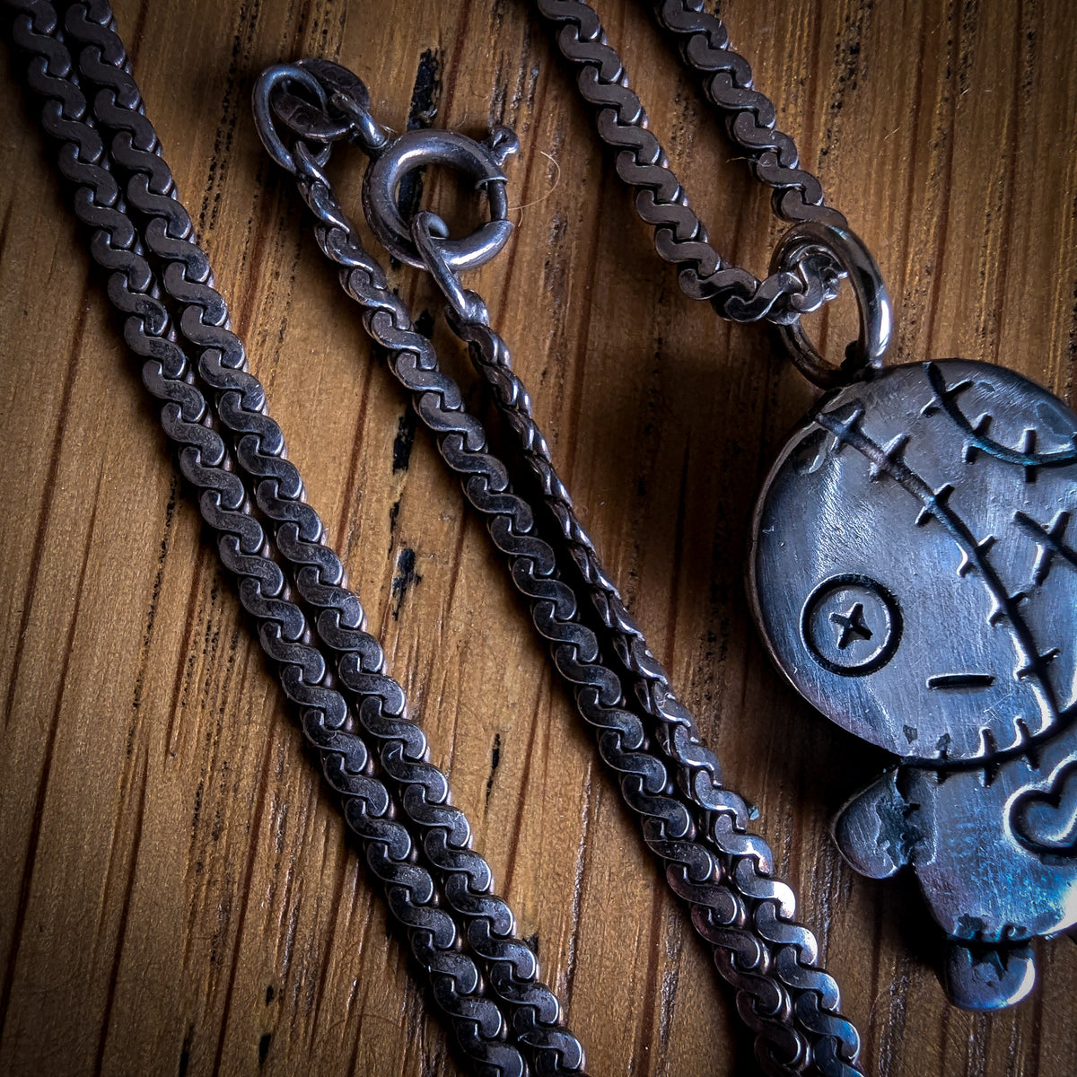 Fine silver spooky kewpie pendant on vintage sterling chain
