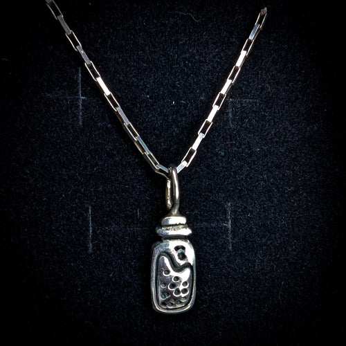 Fine silver potion bottle on vintage sterling chain