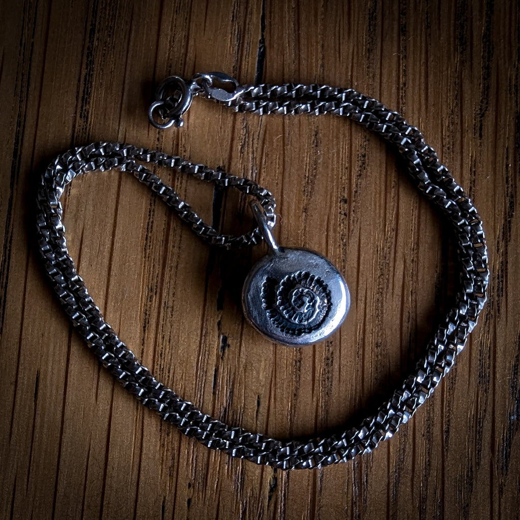Fine silver spiral ammonite pendant on vintage sterling chain