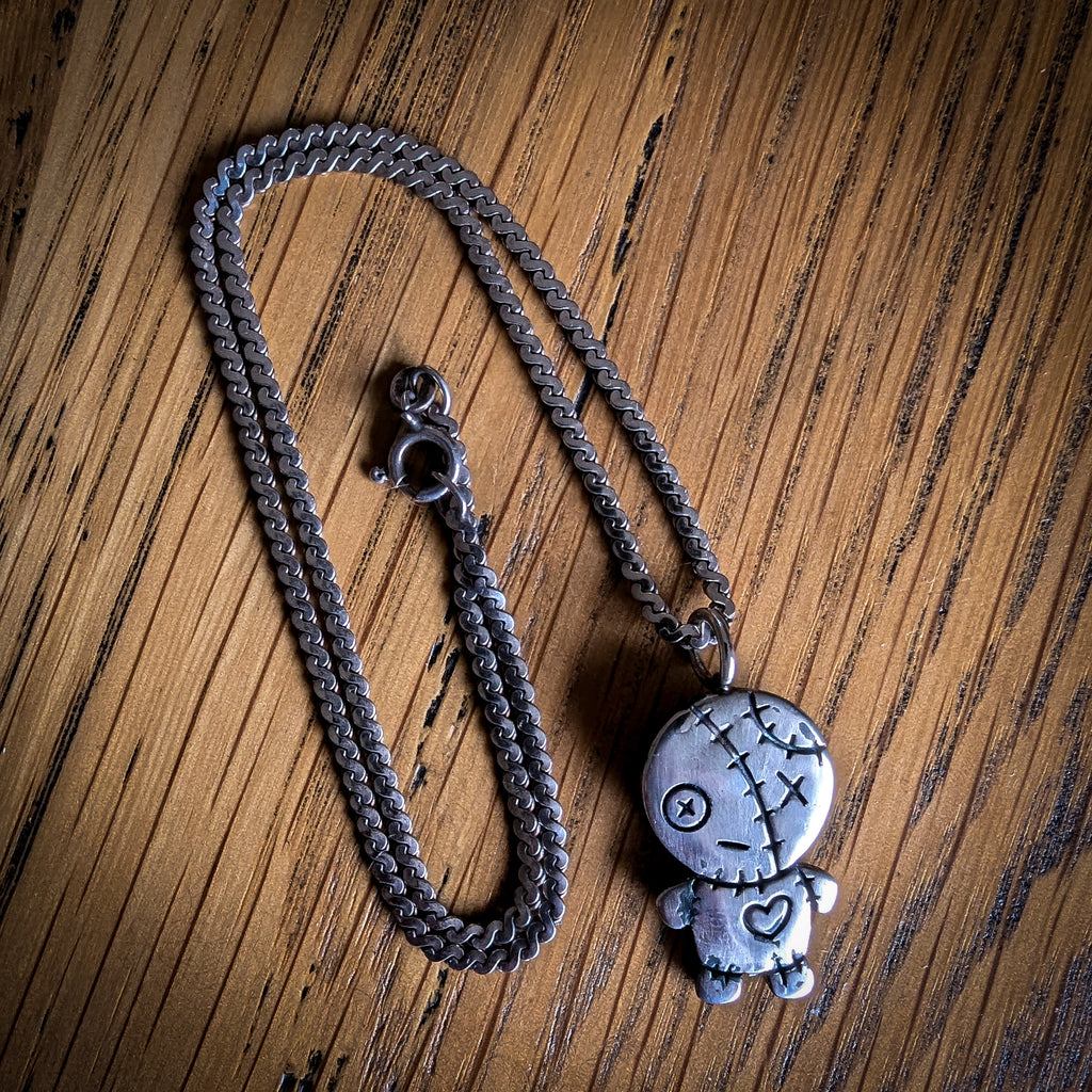 Fine silver spooky kewpie pendant on vintage sterling chain