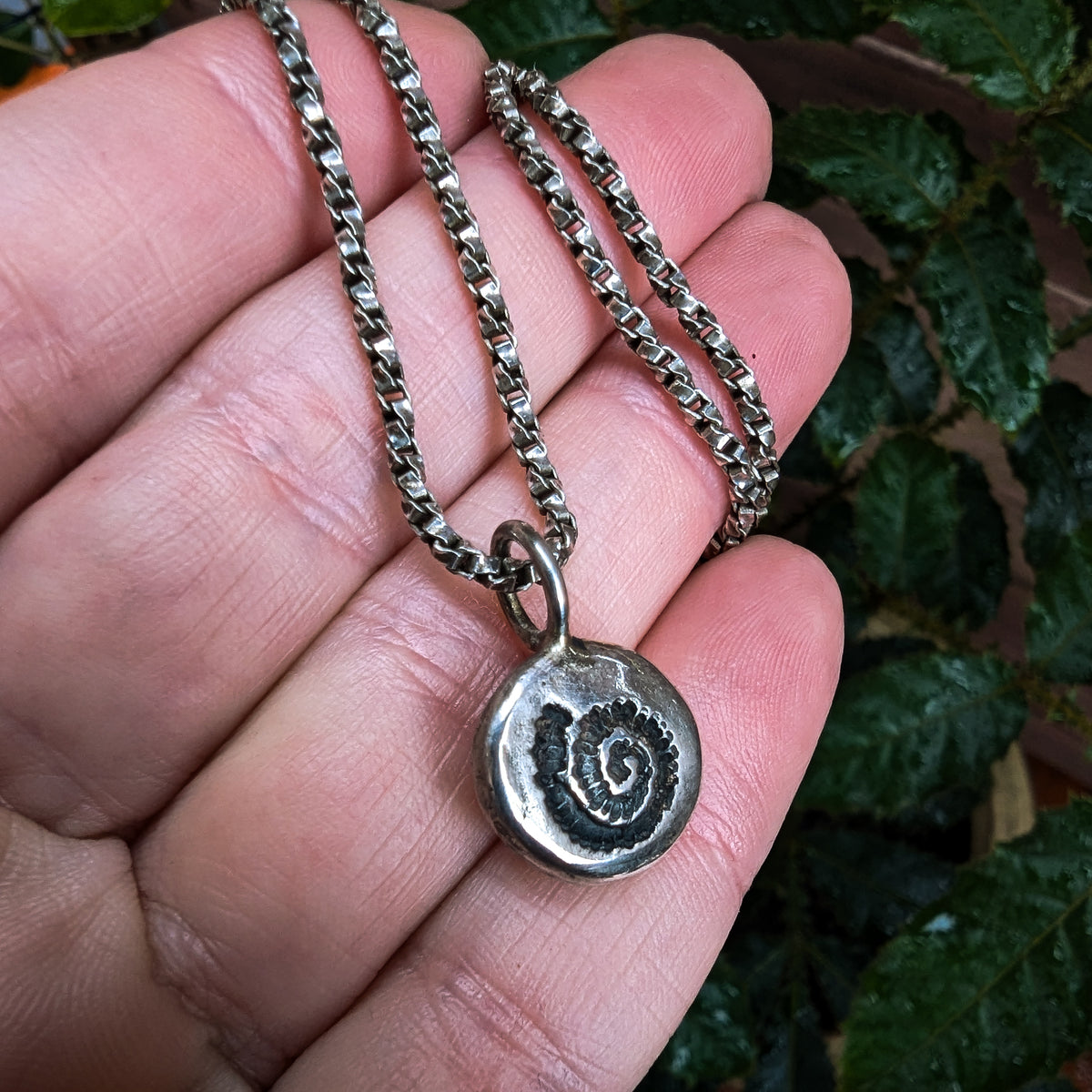Fine silver spiral ammonite pendant on vintage sterling chain