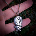Fine silver spooky kewpie pendant on vintage sterling chain