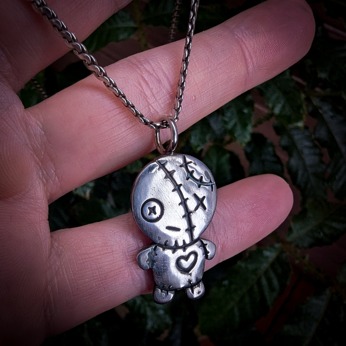 Fine silver spooky kewpie pendant on vintage sterling chain