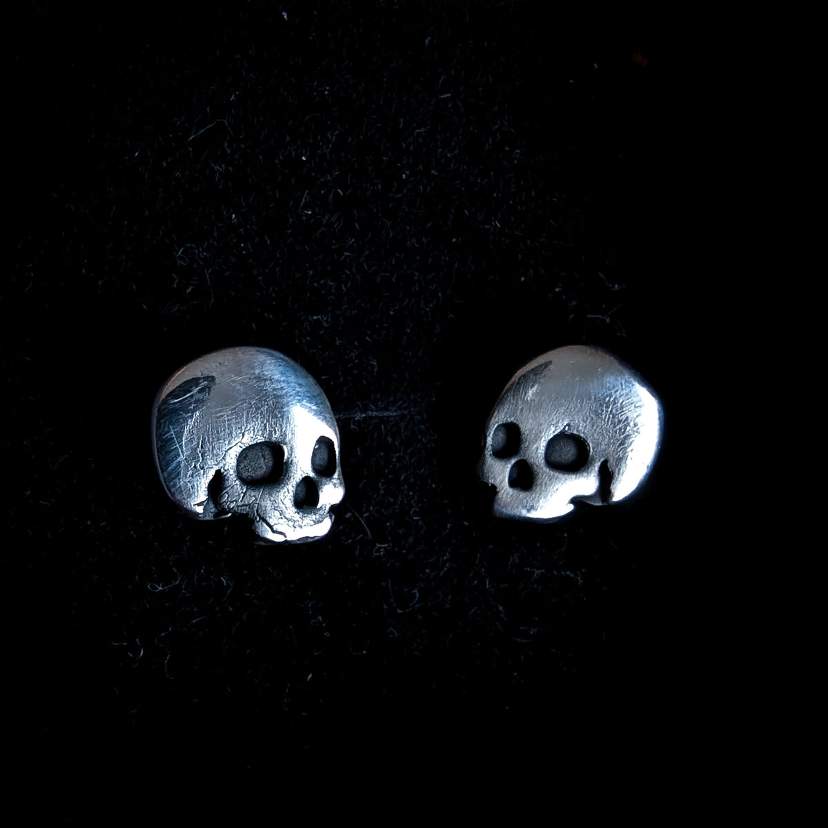 Fine silver skulls - stud earrings
