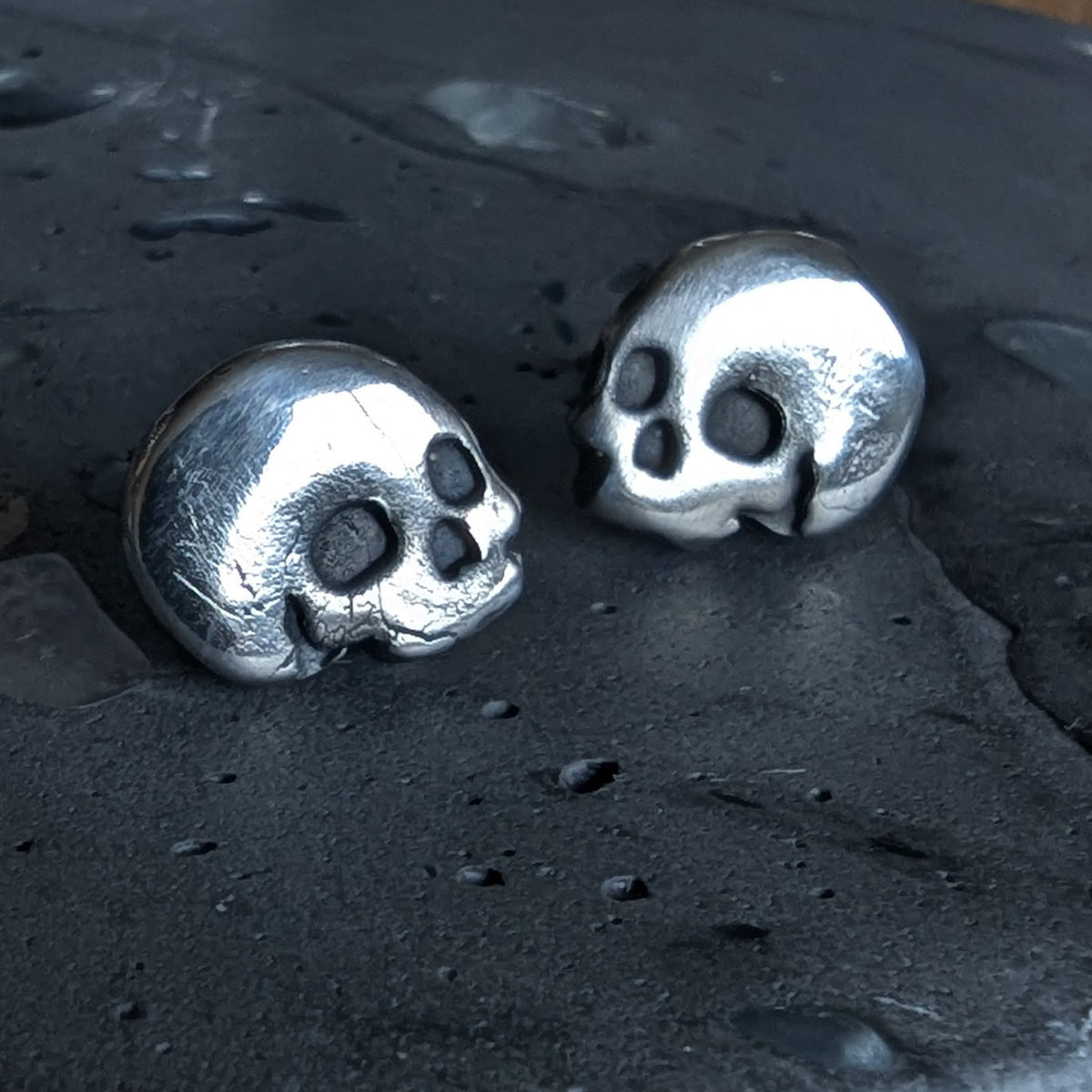 Fine silver skulls - stud earrings