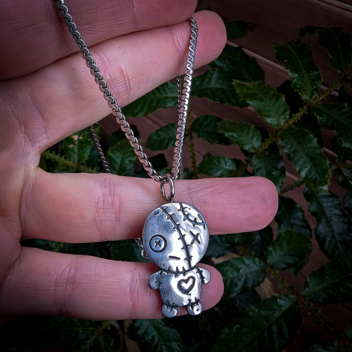 Fine silver spooky kewpie pendant on vintage sterling chain