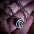 Fine silver spiral pendant on vintage sterling chain