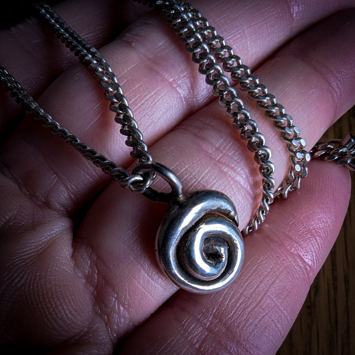 Fine silver spiral pendant on vintage sterling chain