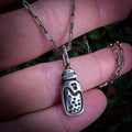 Fine silver potion bottle on vintage sterling chain