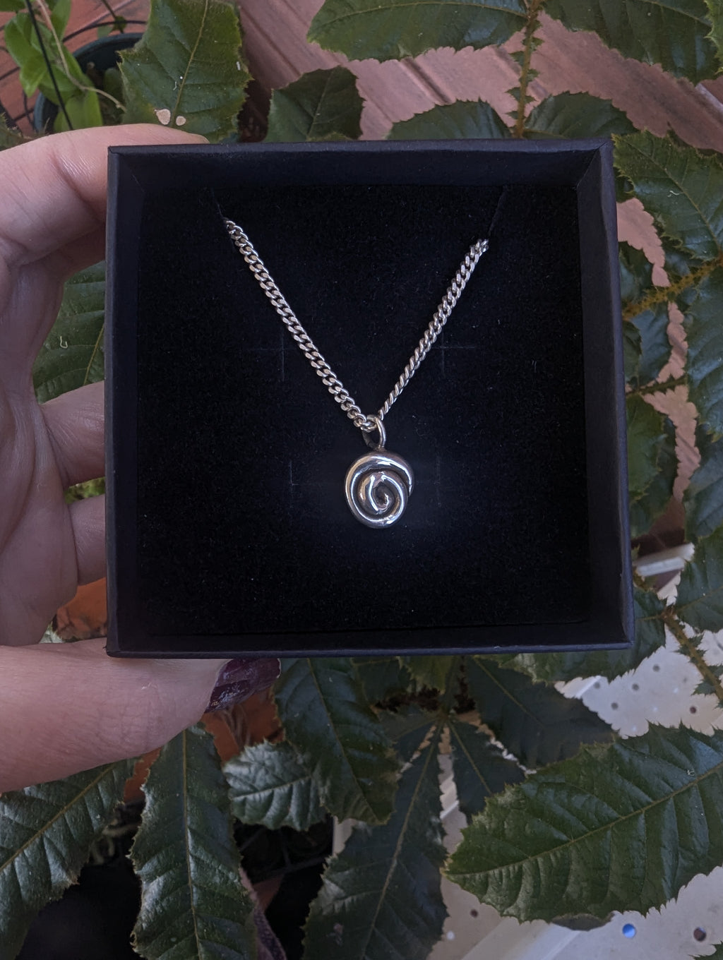 Fine silver spiral pendant on vintage sterling chain