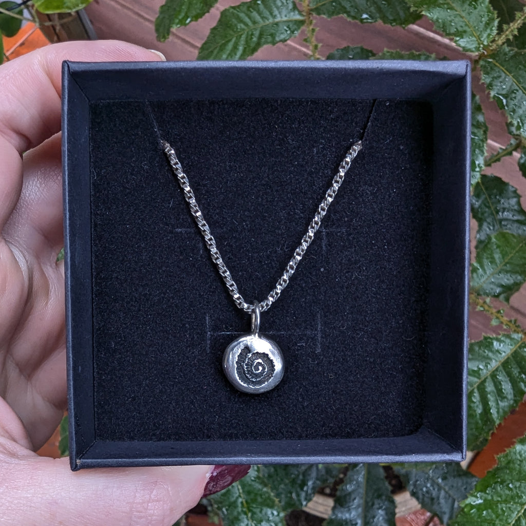Fine silver spiral ammonite pendant on vintage sterling chain